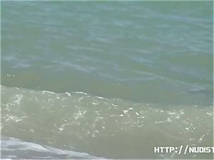 natural tits and vags in this beach spy video